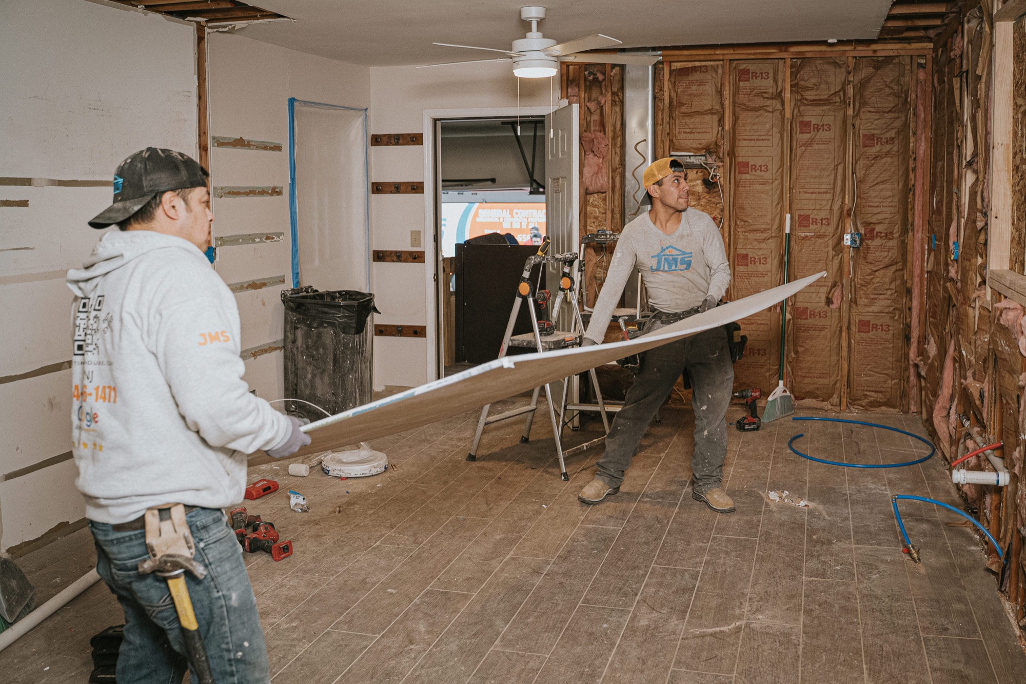 Illustrative crew working on an interior renovation